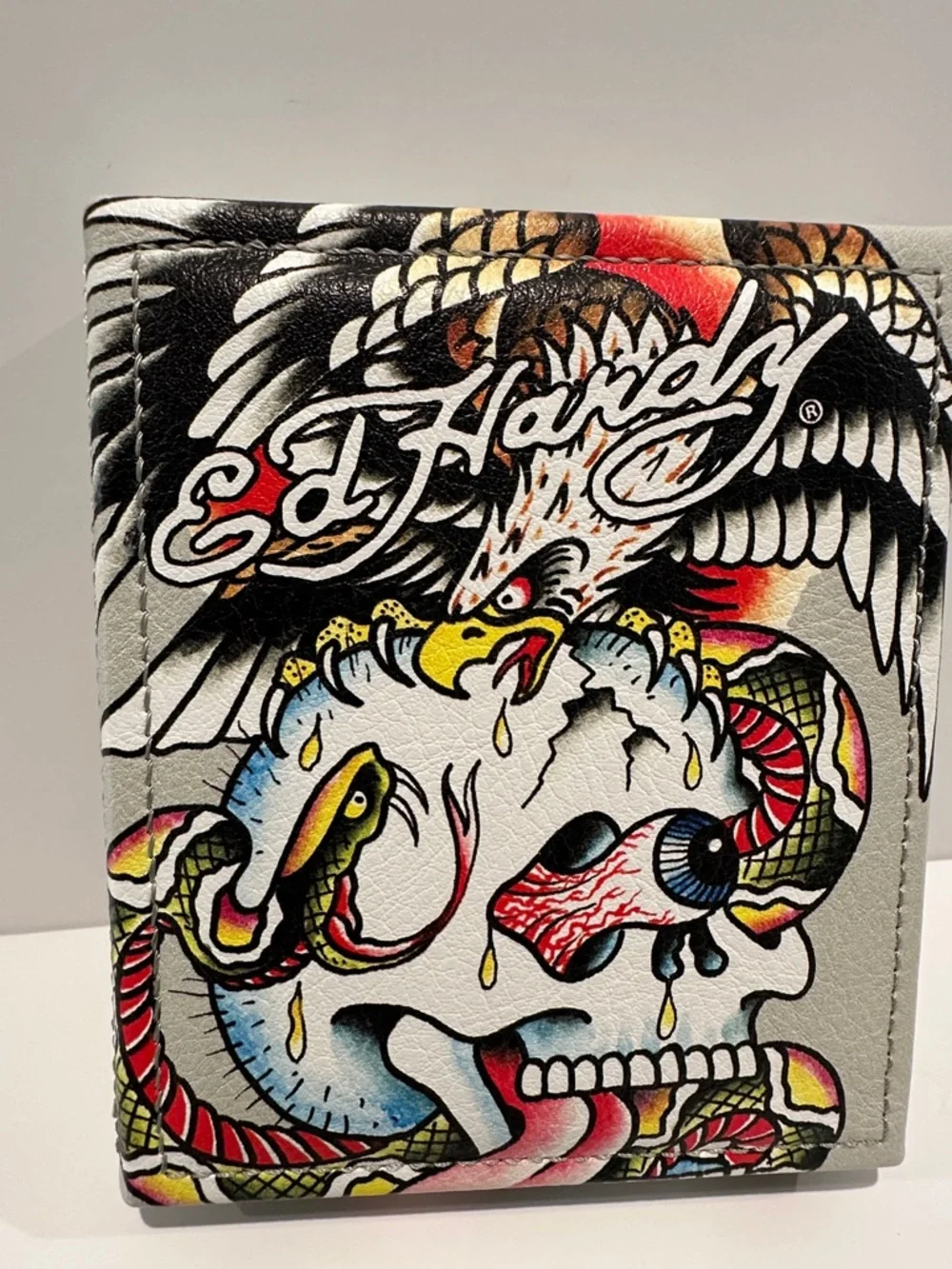 NWT Ed Hardy Men’s Bifold Wallet with Card, ID, Coin and Bill slots.